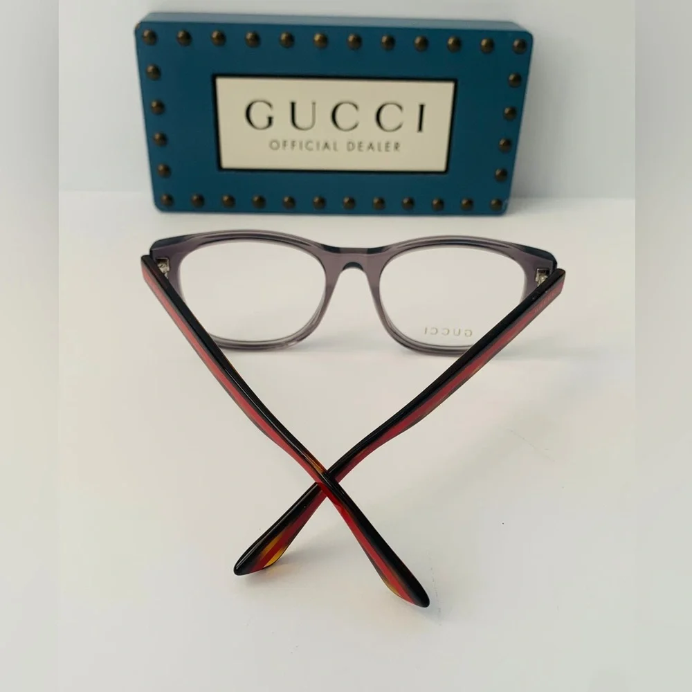 Gucci's GG0004ON features soft lines frames acetate front. Iconic web effect